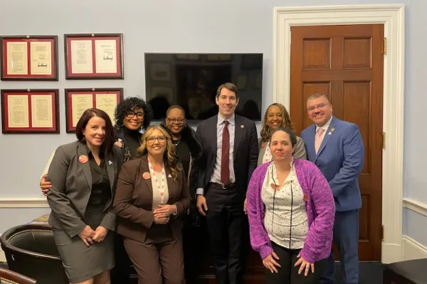 AFSCME members met with Rep. Josh Harder of California (center) on Capitol Hill. Photo courtesy of NENA. 