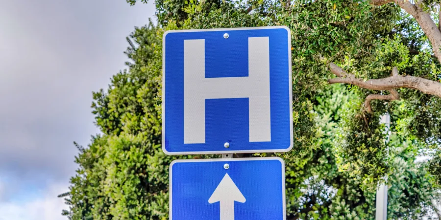 Stock photo of a hospital road sign. Photo credit: Getty Images.